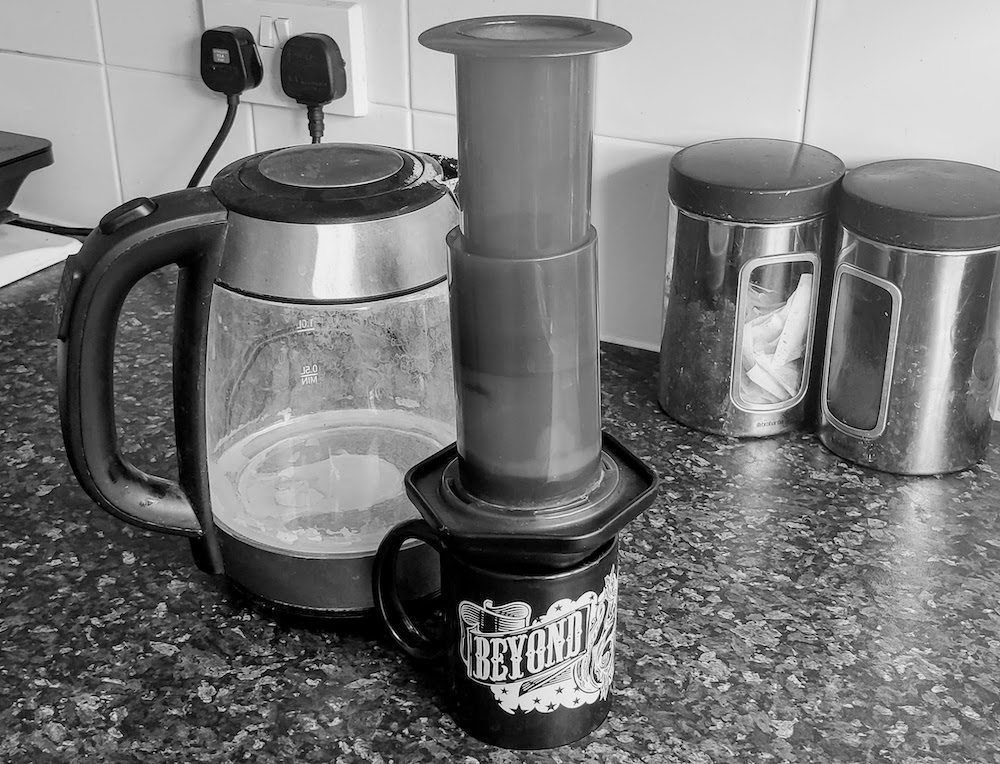 Kettle, AeroPress coffee and mug