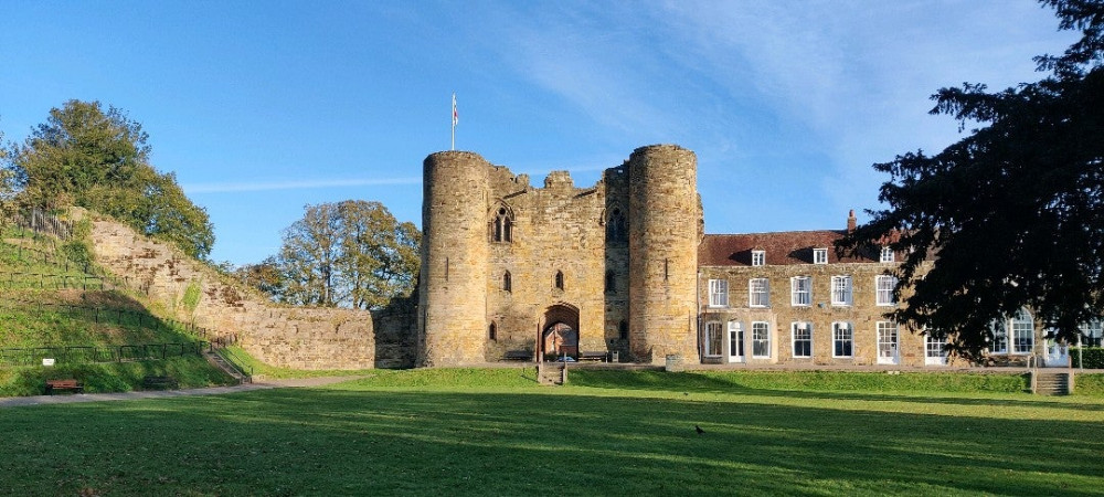 Tonbridge Castle beneath a bright, clear blue sky