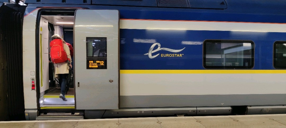 Eurostar door with destination display showing Brussels and Lille