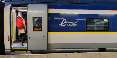 Eurostar door with destination display showing Brussels and Lille