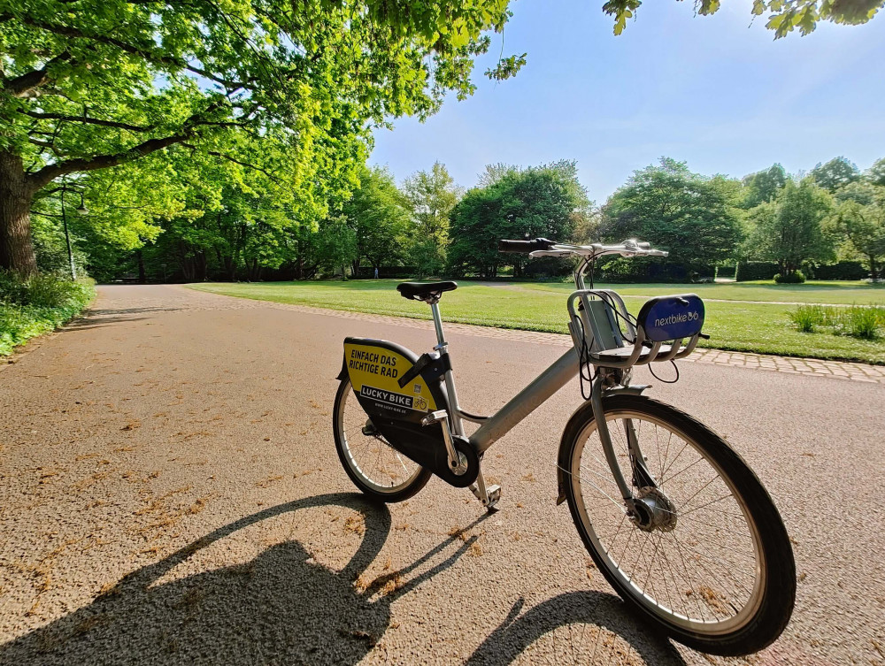 Hire bicycle in Volksgarten Düsseldorf on a bright Spring morning