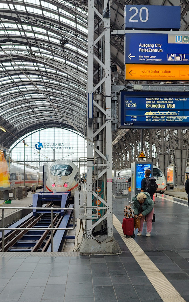 front view of ICE train inside Frankfurt Am Main Hauptbahnhof and destination screen with Brussels