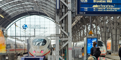 front view of ICE train inside Frankfurt Am Main Hauptbahnhof and destination screen with Brussels