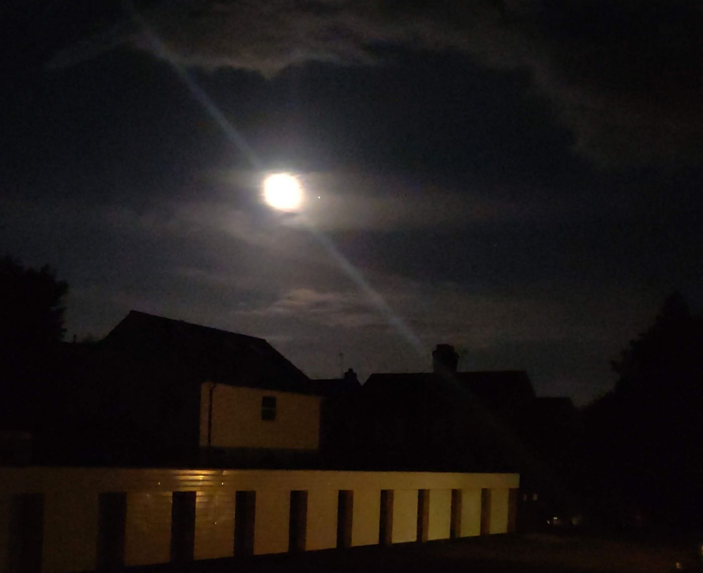 Night sky looking at the Moon and Jupiter