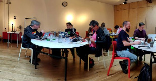 People inside hacking at 68 Middle Street for IndieWebCamp Brighton 2019